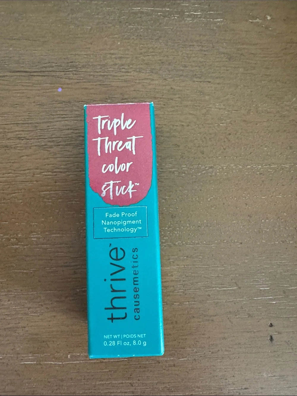 thrive causemetics Triple Threat Color Stick - Teal & Coral Red